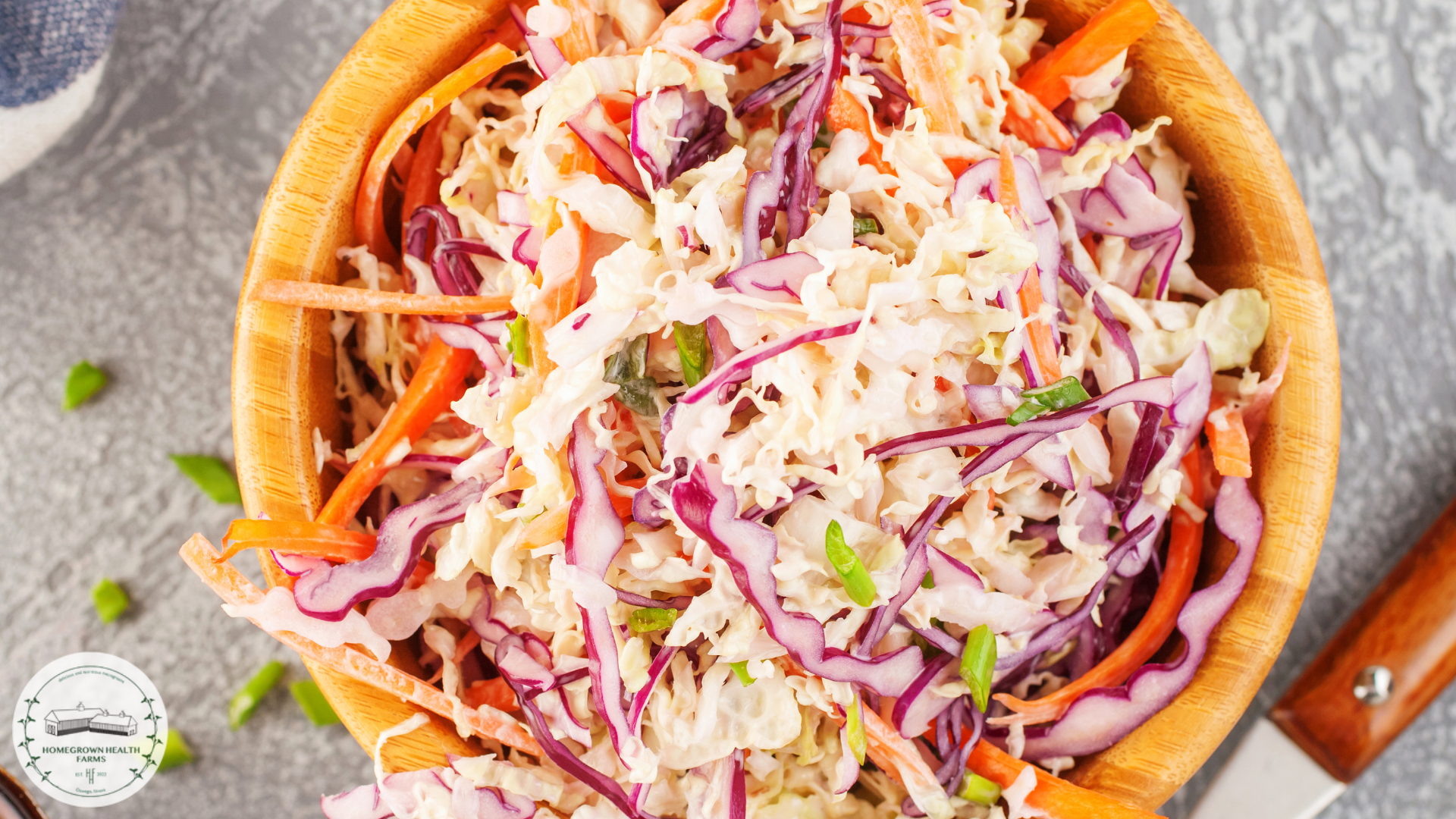 A vibrant healthy coleslaw recipe in a beautiful orange bowl, ready to eat.